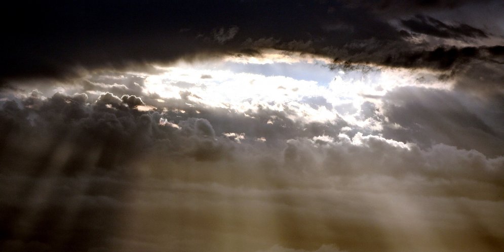 Lichtstrahlen im Wolkenhimmel Leinwand