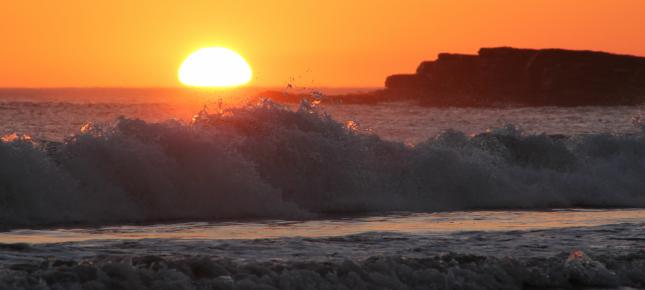 Sonne im Meer Bild auf Leinwand