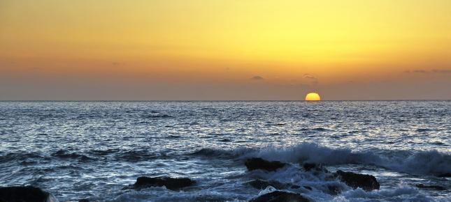 Sonne im Meer Bild auf Leinwand